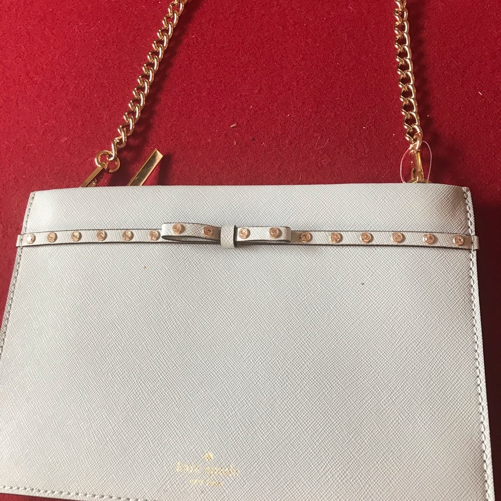 Kate Spade periwinkle small bag with gold chain and rhinestone never carried